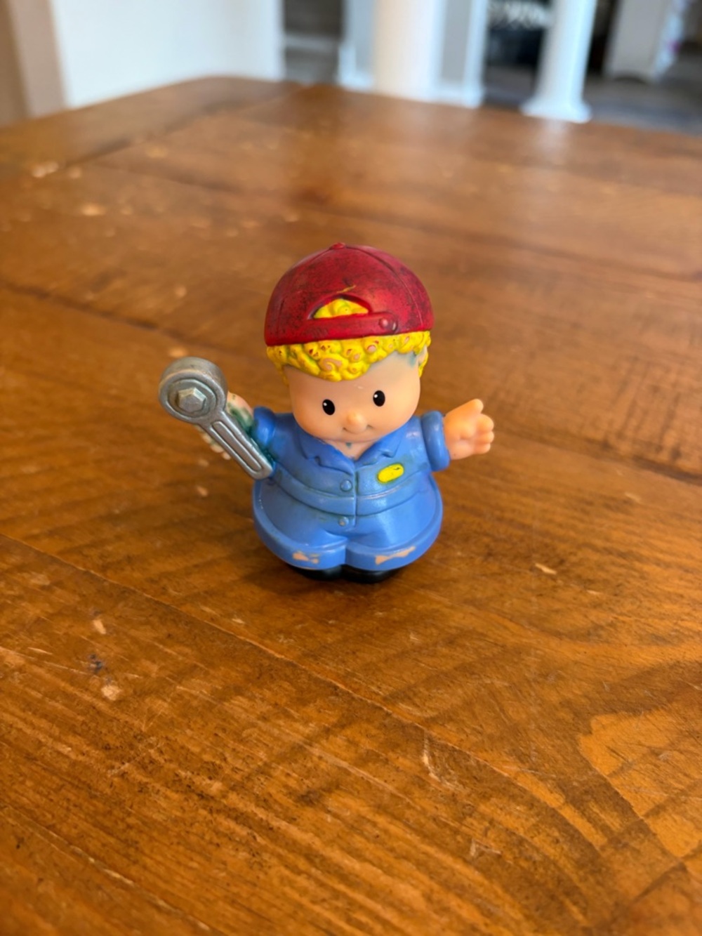 Fisher Price Little People mechanic as is. He has a lot of pen on him